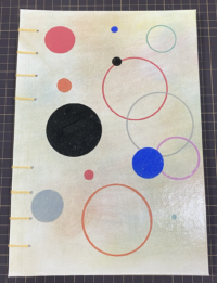 handmade notebook with colorful circles